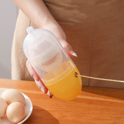 MANUAL EGG PULLER SCRAMBLER HOUSEHOLD WHITE EGG YOLK MIXER KITCHEN TOOL MIX MANUAL SCRAMBLER CONVENIENT WITHOUT BREAKING EGGS.